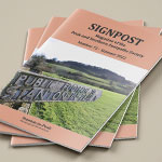 A small pile of Signpost magazines